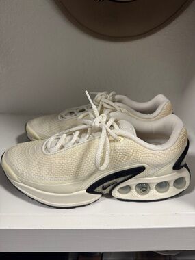 Nike Women's Cream White Athletic Sneakers with Black Accents